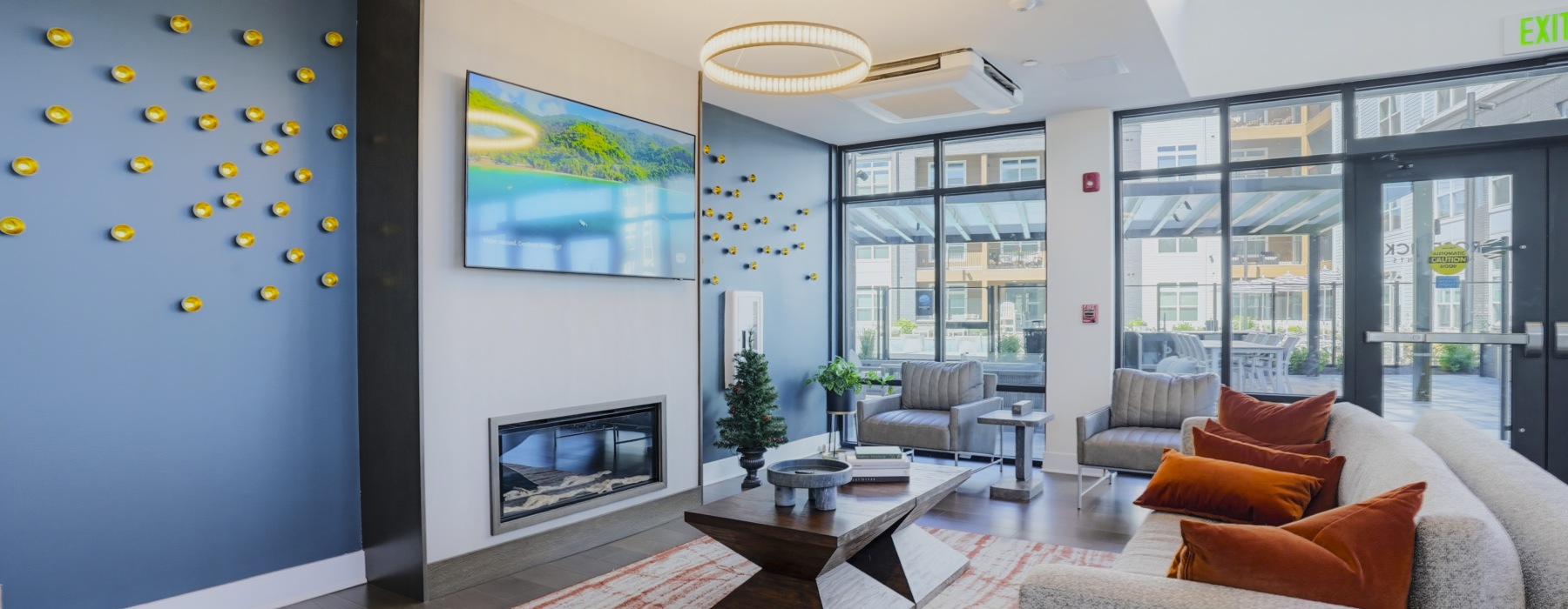 A fireplace with tv and ample seating