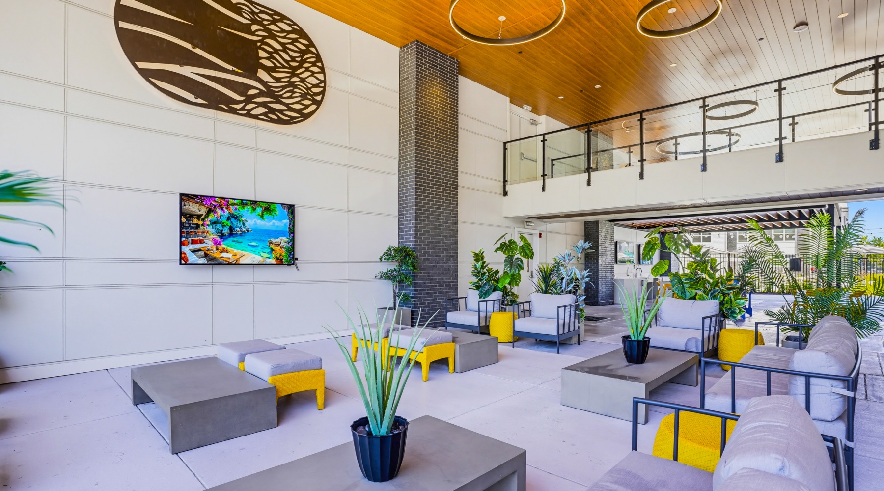 Beautiful breezeway with lounge seating and ample light