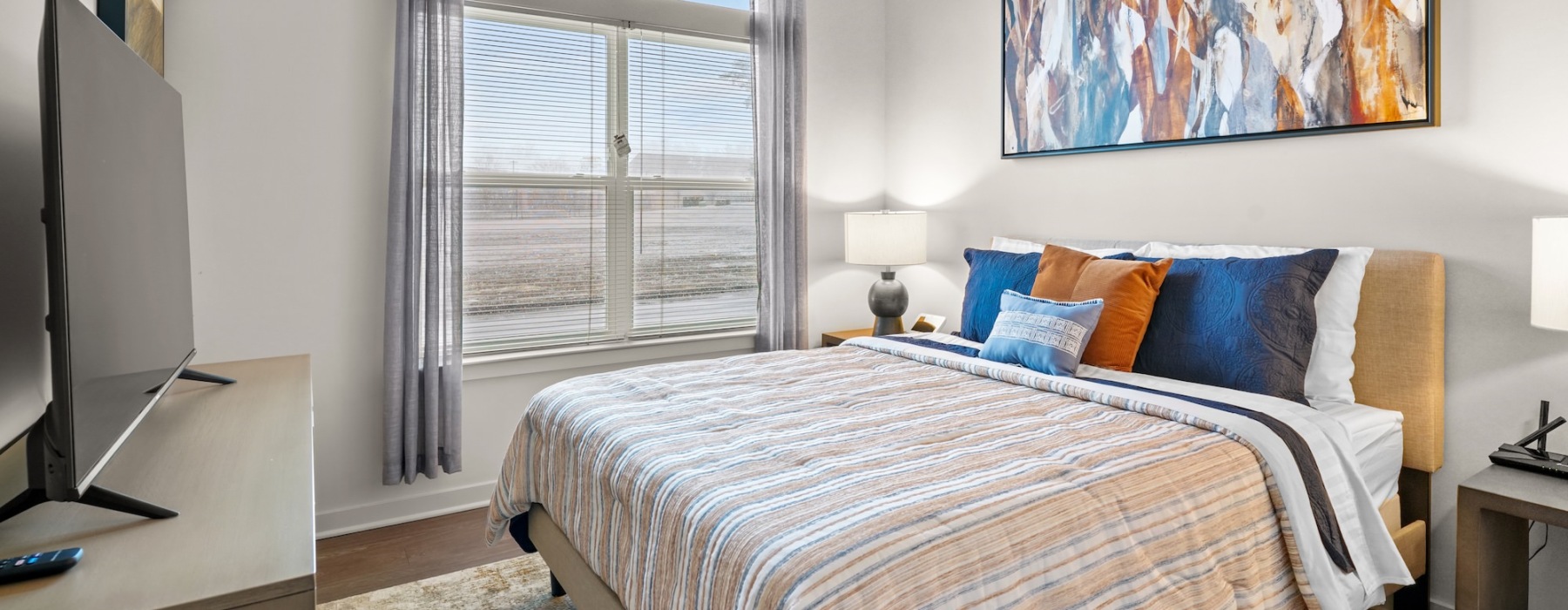 Bedroom with natural lighting and high ceilings